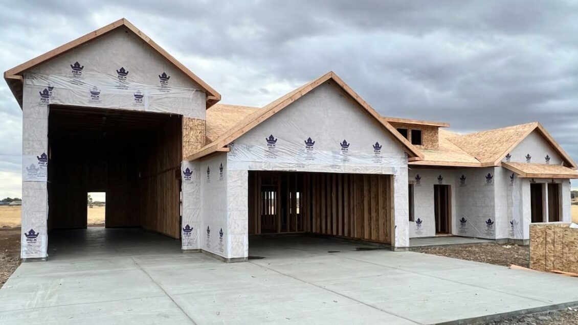 Exterior finishing phase during the custom home building timeline - Pathway Builders Idaho