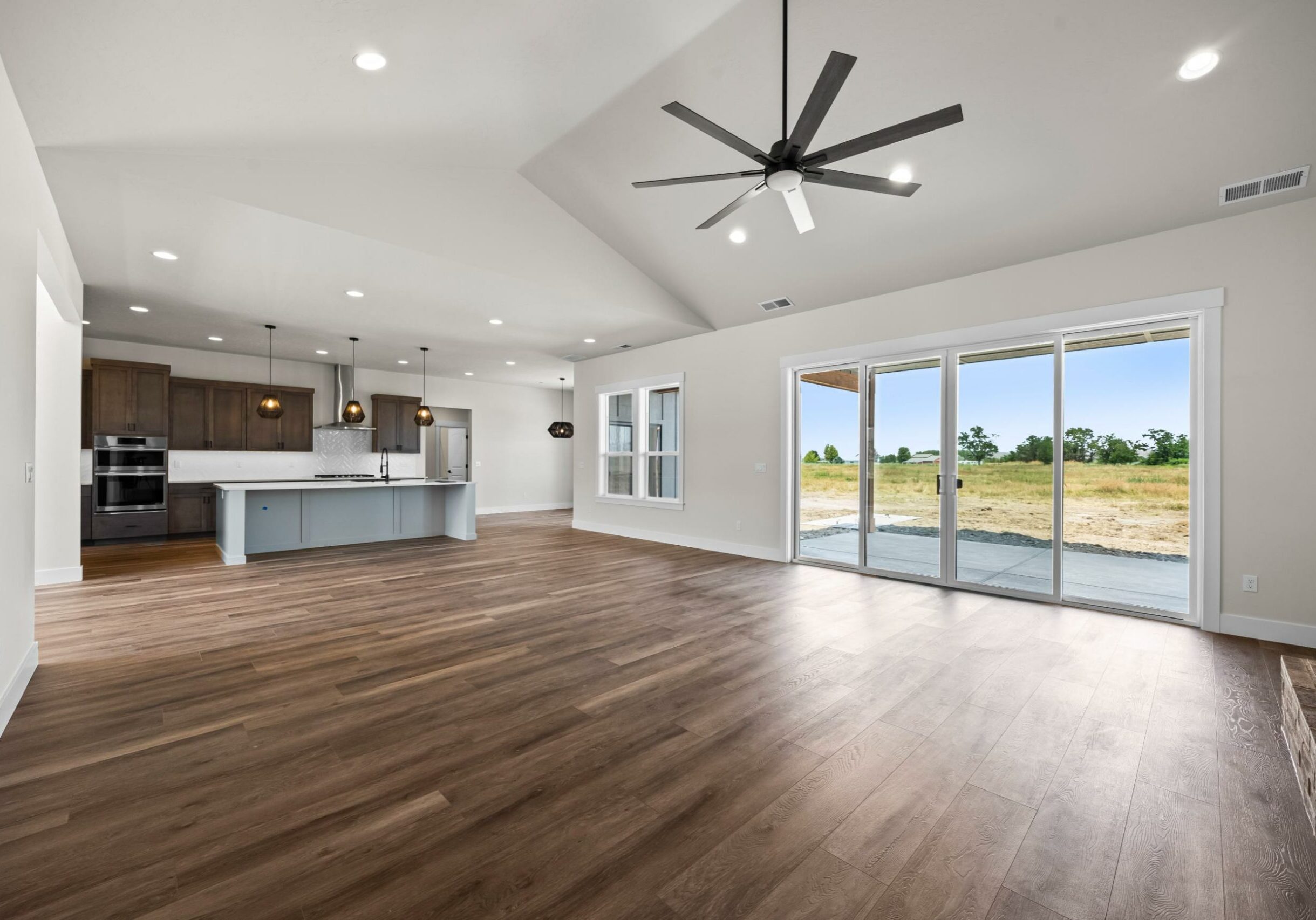 Living Room - Pacific Crest Ranch Style House Plan - Pathway Builders Idaho